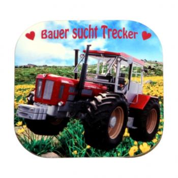 Fotountersetzer mit freigesteltem Traktor und Schriftzug